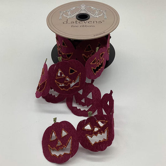 2.5" x 5yds felt cut out jack- O-lanterns, orange glitter/purple
