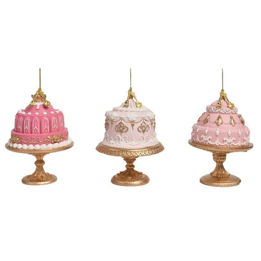 3 Assorted Pink Cakes On Gold Base Ornaments.